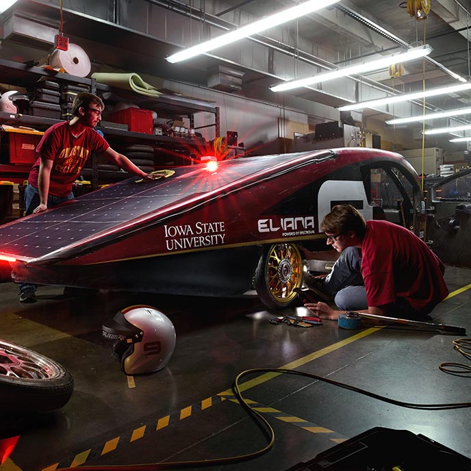 Students work on the ISU Prism solar car.